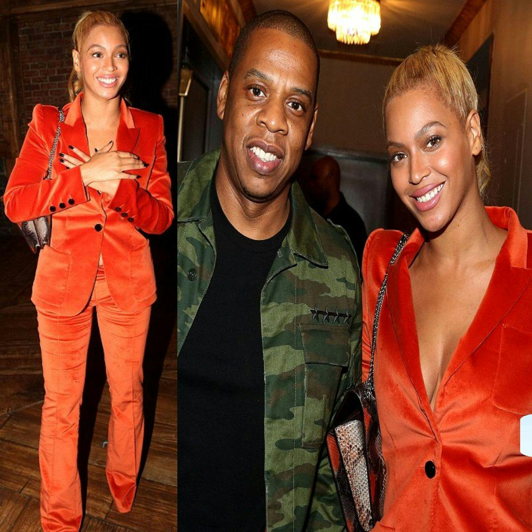 Cover Image for Beyoncé stuns in orange velvet vest while Jay Z channels classic style for Broadway date night.